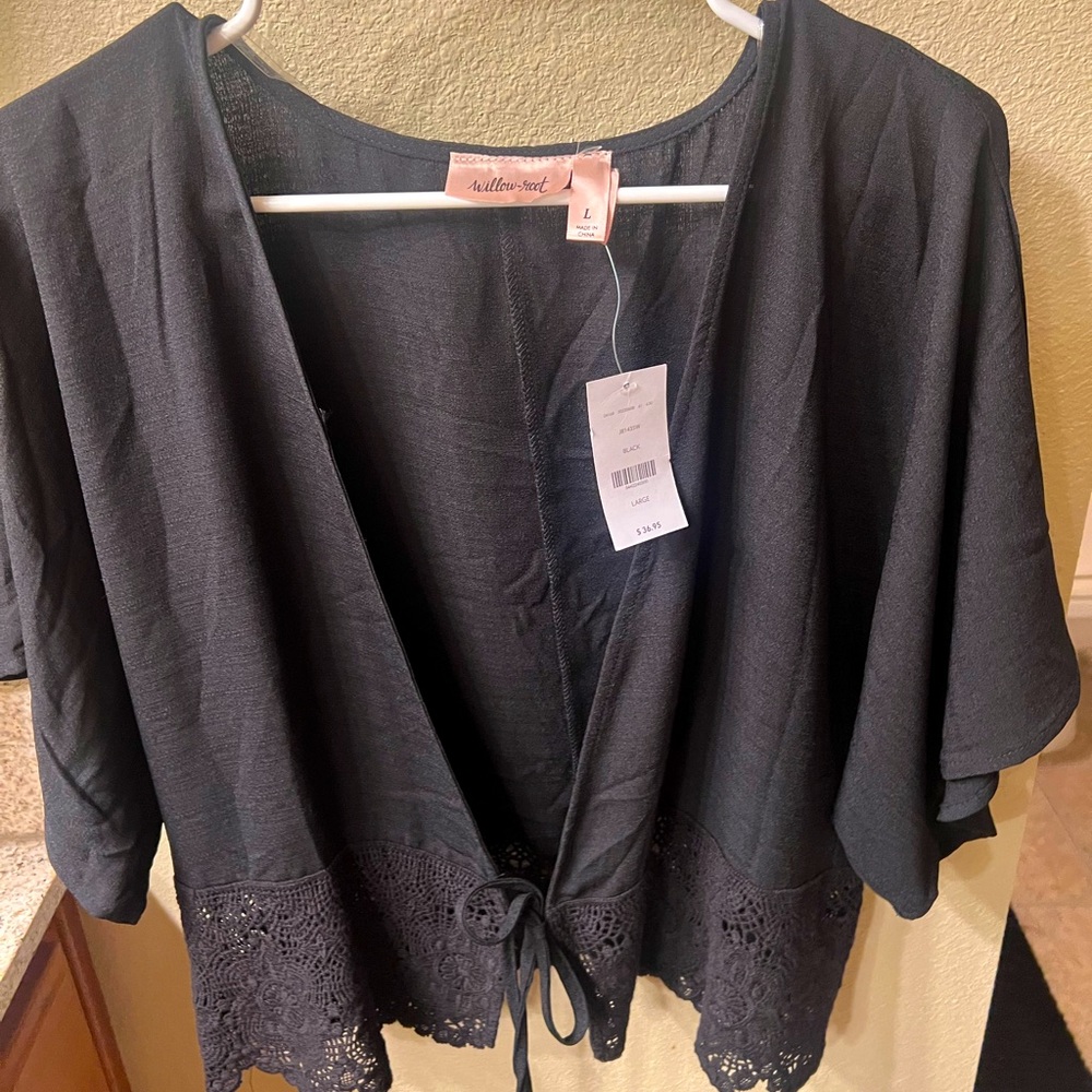 Woman’s black top from Buckle